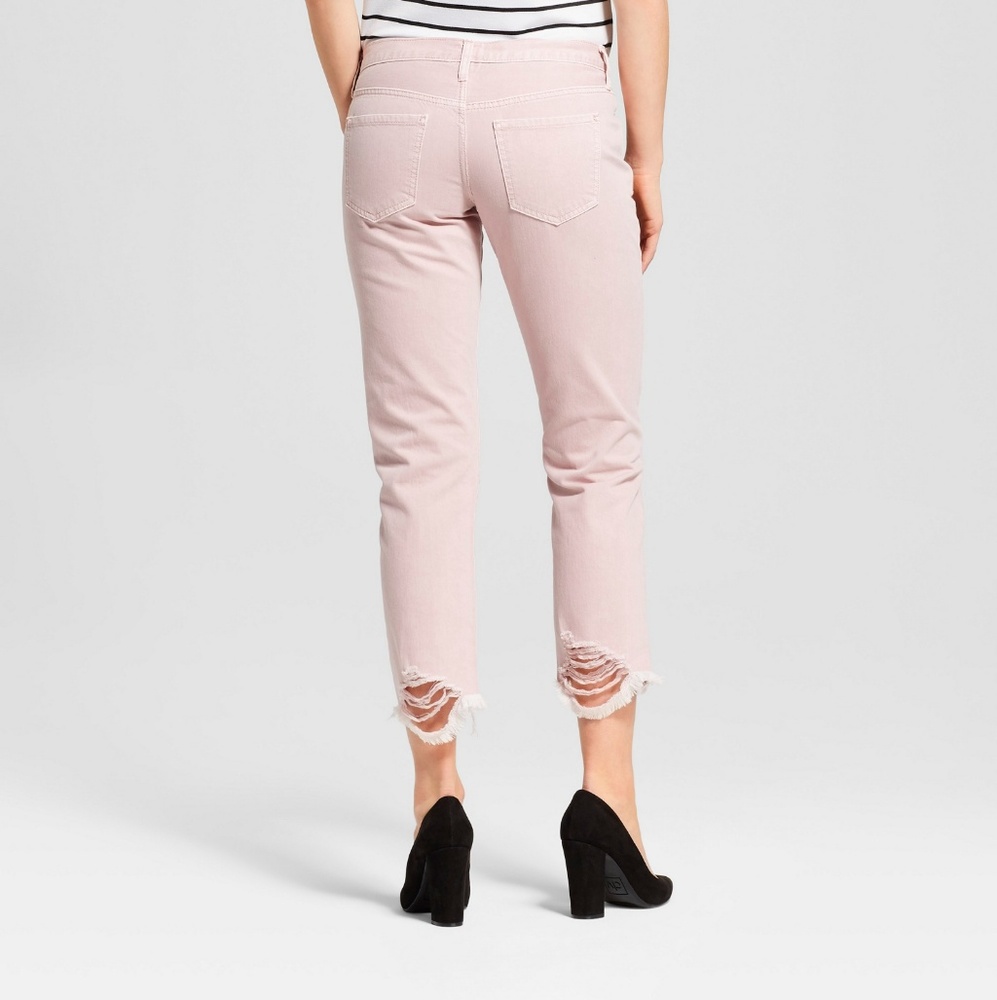 Low rise distressed boyfriend jeans in soft pink